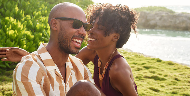 A couple enjoying the waterfront view