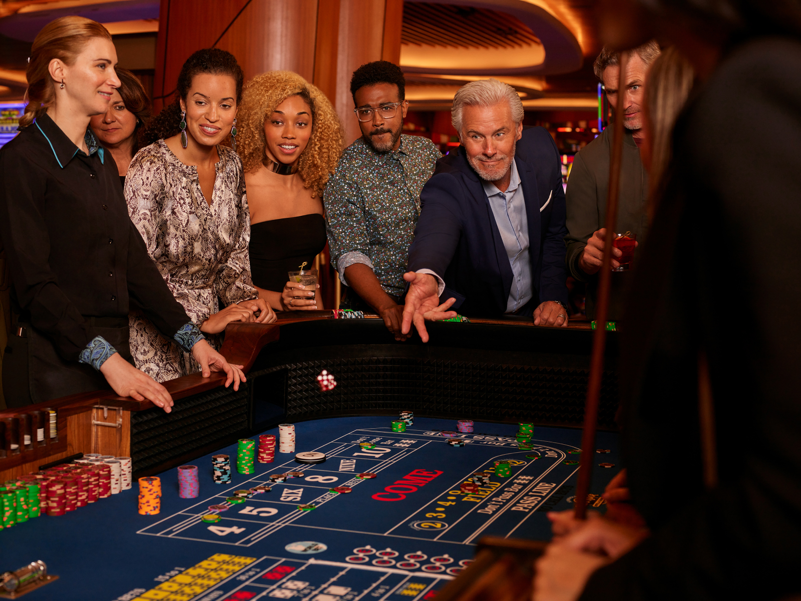 Friends playing craps together