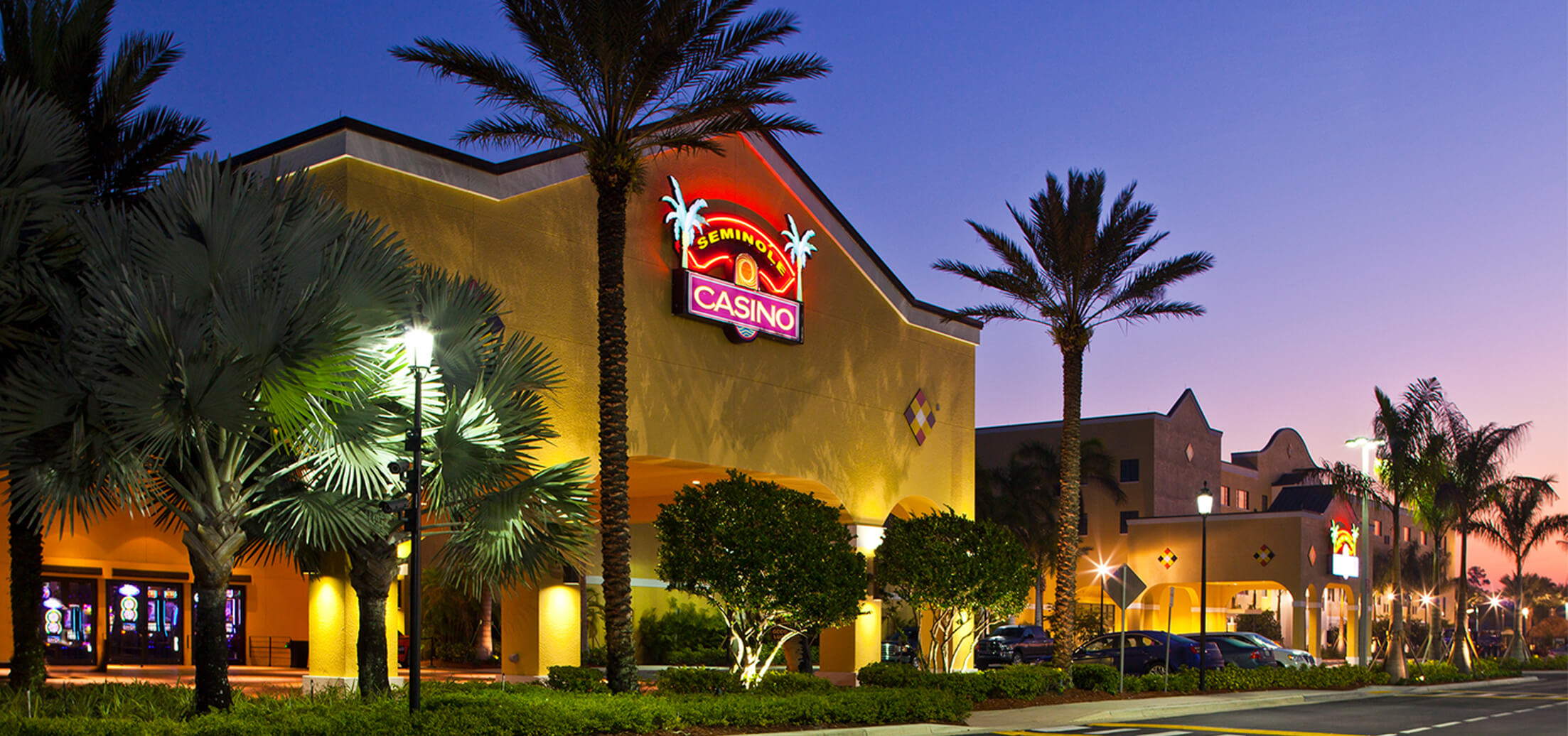 Photo of Seminole Casino Hotel Immokalee front entrance at sunset